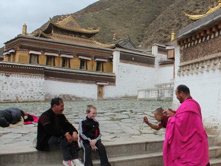 china-with-kids-monks-cell-phones-labrang-monastery